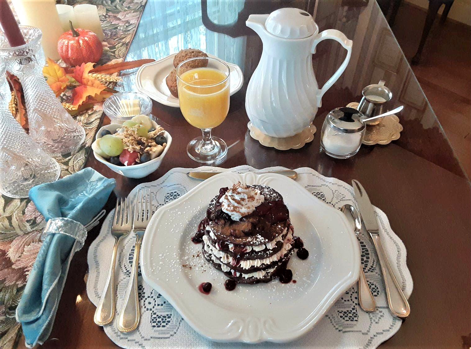 Hot Chocolate Pancake Served with Berry Sauce